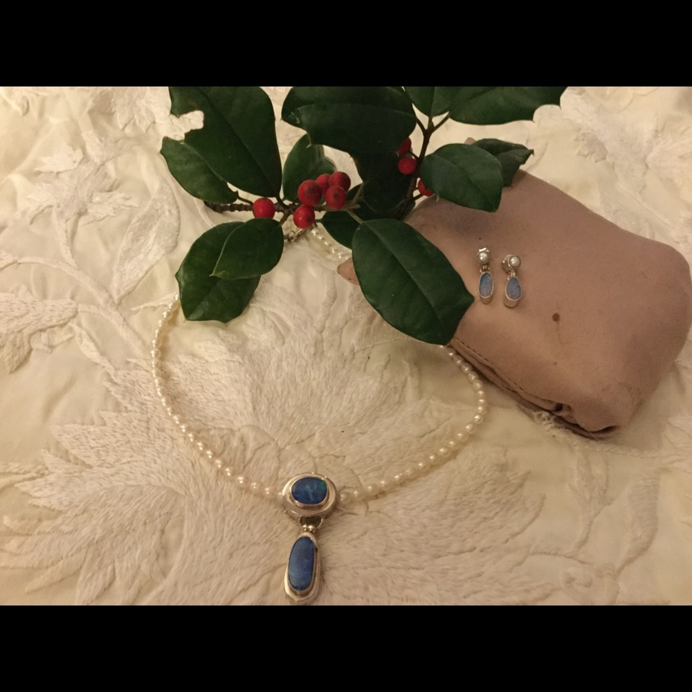 Opal pendant on seed pearls with opal earrings.